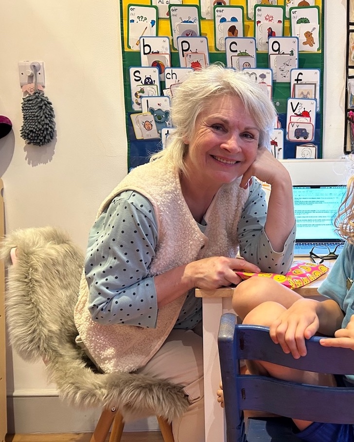 Why structure, high expectations and warmth matter in speech therapy. A photo of Sonja McGeachie smiling.